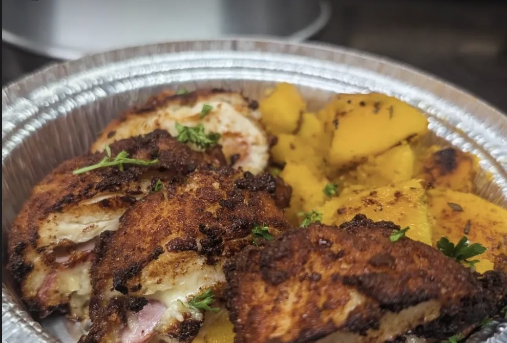 Chicken Cordon Bleu with roasted butternut squash, a meal prepared through the Chez Leon community meal program.